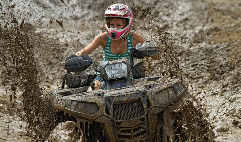 ATV insurance Florida - woman riding off-road vehicle