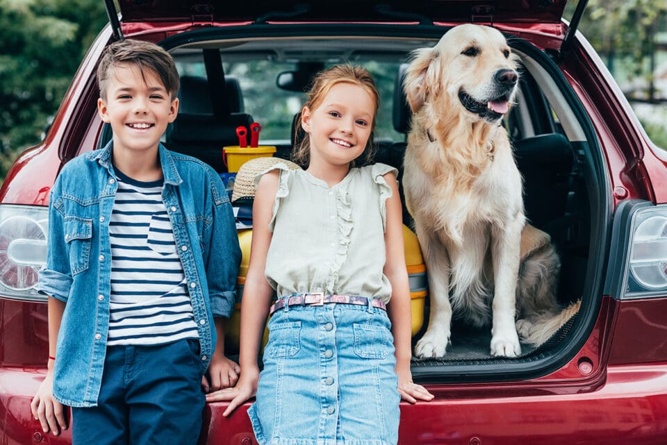 Family enjoying their insured SUV