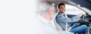 Man driving with father in an insured vehicle