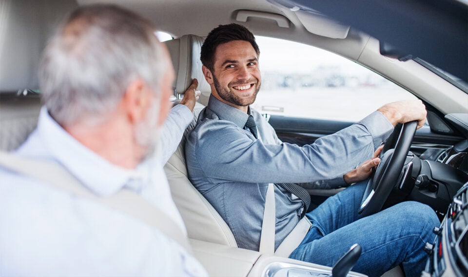 Man driving with father in an insured vehicle
