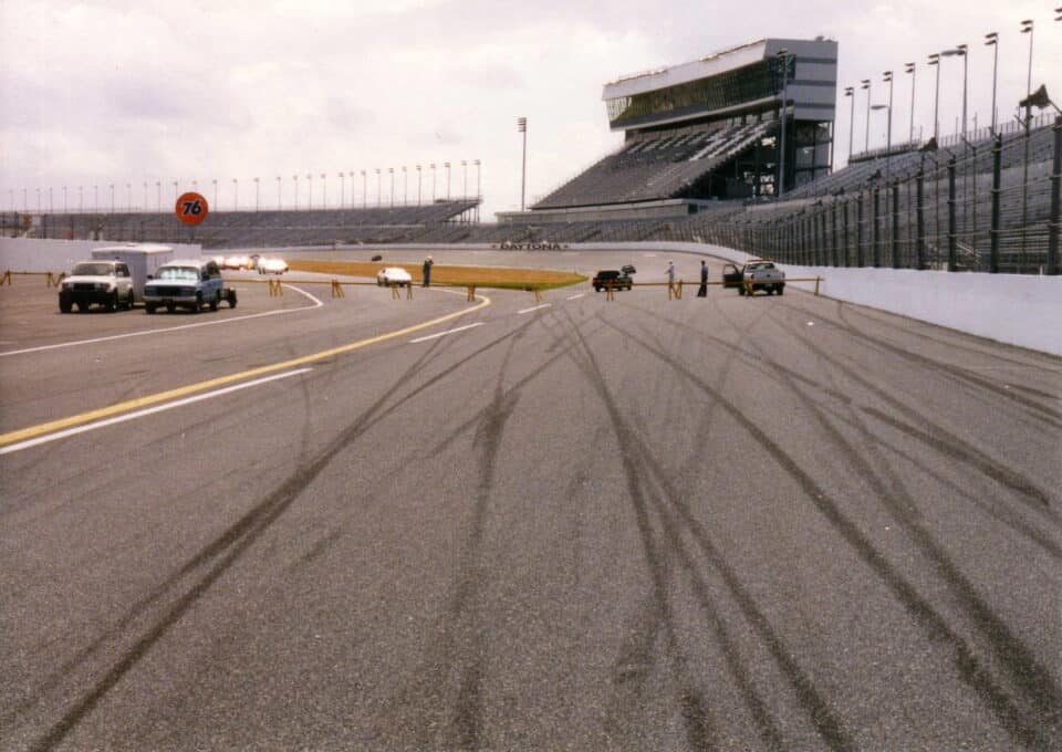 The banked track and grandstands at Daytona International Speedway in Daytona Beach, Florida