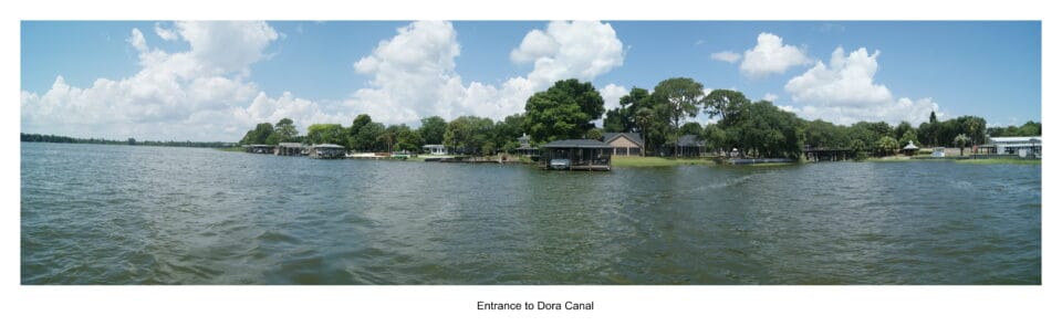 Lakefront homes and boathouses at the entrance to the Dora Canal in Tavares, Florida