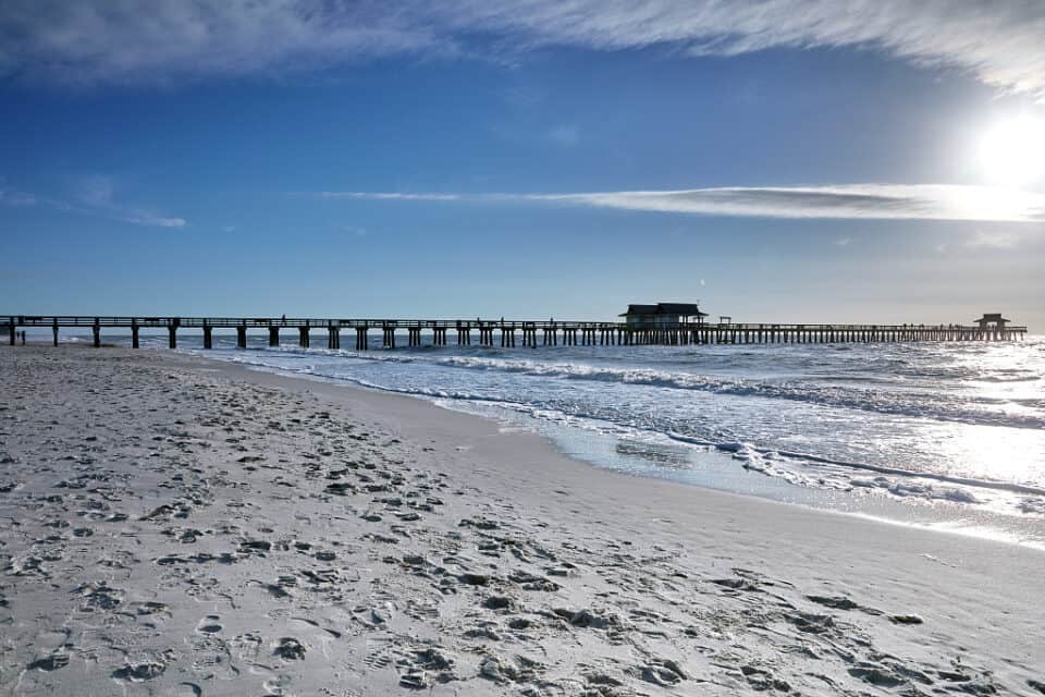 The Naples Pier near sunset on the Gulf of Mexico in Naples, Florida