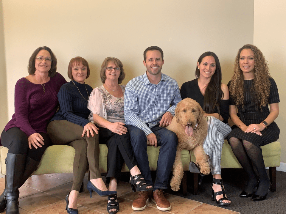 Cornerstone team with office dog Beau